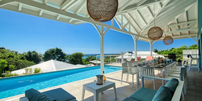Location maison Martinique - salon extérieur vue mer